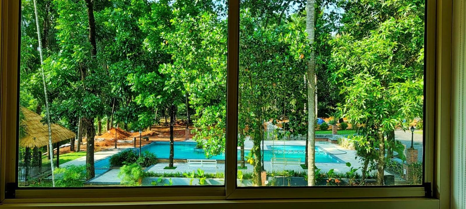 Athirapilly On The Rocks Hotel Athirappilly Ngoại thất bức ảnh